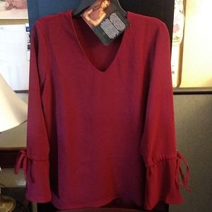 Iman burgundy v neck blouse size large NWT